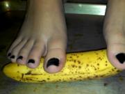 Messy banana crushing with toes