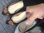 Ejaculating into two pairs of shoes