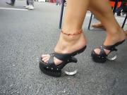Naughty girl has a lot of fun wearing her kinky shoes in public