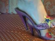 Showing off purple open toe mules