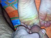 Rubbing uncut foreskin and cumming on toes