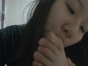 Asian teen sucks her big toe