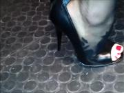 Peeptoe stilettos on metallic floor