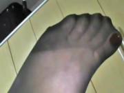 Amateur feet in sexy black nylons