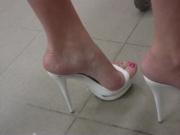 Shopping in white open toe mules