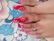 Very long toenails with Hawaiian print