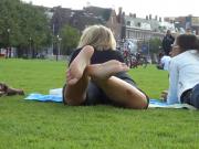 Two Hot Young Unsuspecting Ladies Get Their Cute Bare Feet Filmed On The Grass