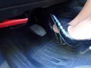 Hot Woman In Blue Gator High Heels Pushes Down Her Car's Gas Pedals