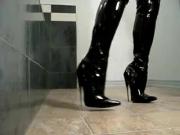 Thigh high boots with long spiked heels