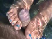 Giving Footjob and Handjob in the pool