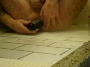 Gay Slut stuffing his ass in the shower