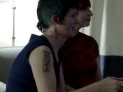 Inked transgirl straponfucked by redhead babe