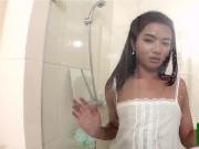 Asian ladyboy jerking cock after shower