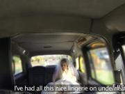 Bride in wedding dress bangs in cab