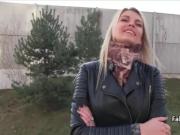 Hot tattooed blonde fucks for cash in public