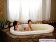 Two cute teens pleasuring in the bathtub