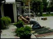 Haggard blonde fucked from behind in backyard