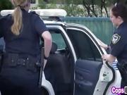 Two cougar police officers sharing fat black cock outdoors