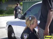 Blonde cop sucking big tits friend